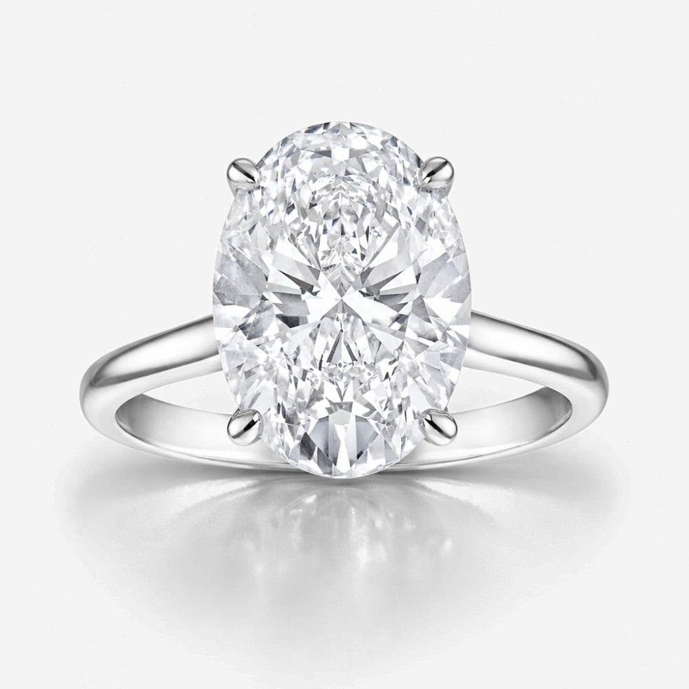 Oval Cut Hidden Halo Solitaire Engagement Ring in Solid Gold⁠