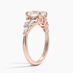 Oval Cut Graduated Diamond Cluster Engagement Ring in Solid Gold⁠