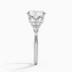 Oval Cut Graduated Diamond Cluster Engagement Ring in Solid Gold⁠