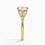 Oval Cut Graduated Diamond Cluster Engagement Ring in Solid Gold⁠