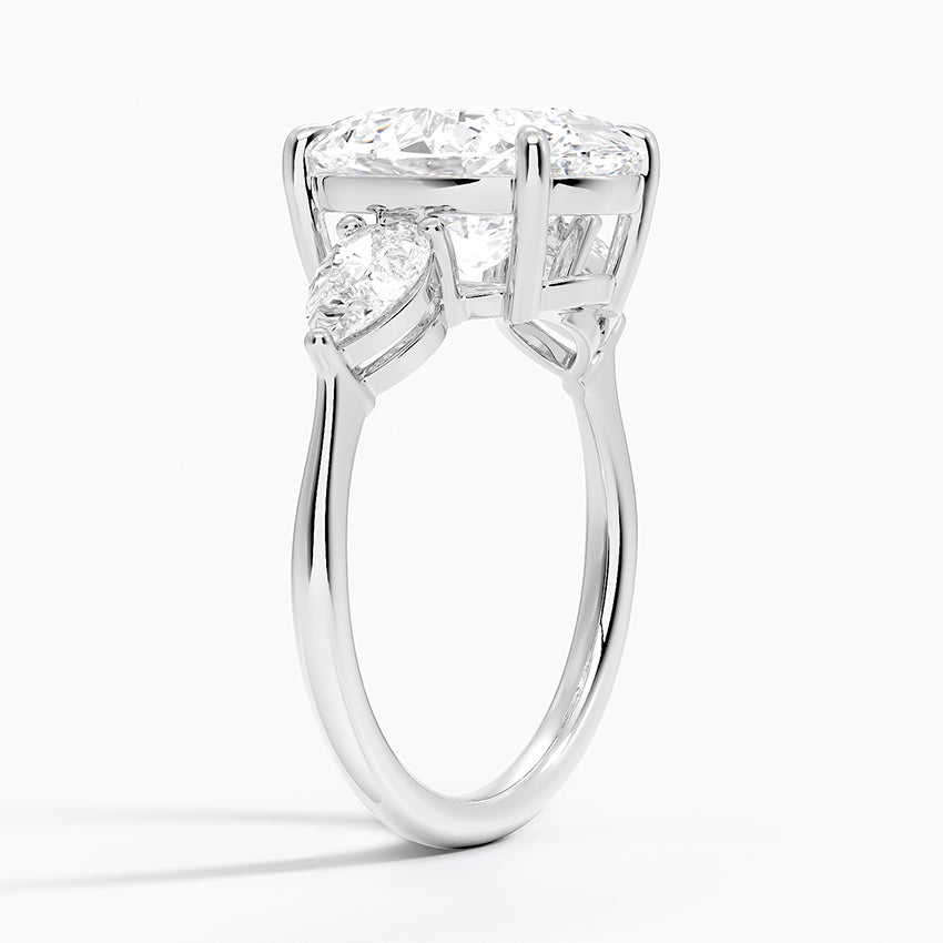 Pear Cut Three-Stone Engagement Ring in Solid Gold⁠