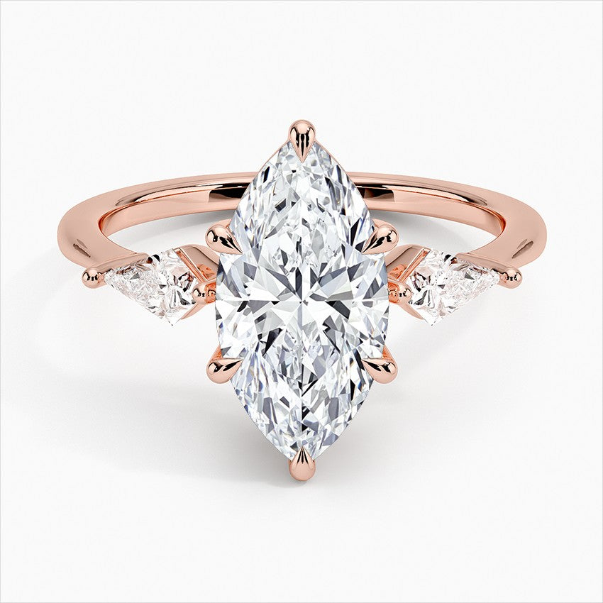 Marquise Cut Three-Stone Engagement Ring with Kite Side Accents in Solid Gold