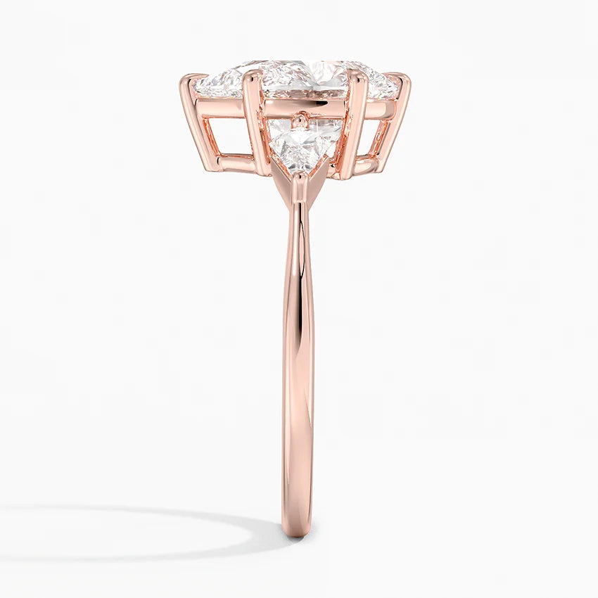 Pear Cut Three-Stone Engagement Ring with Pear Side Accent Diamonds in Solid Gold⁠
