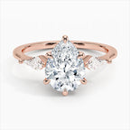 Pear Cut Three-Stone Engagement Ring with Pear Side Accent Diamonds in Solid Gold⁠