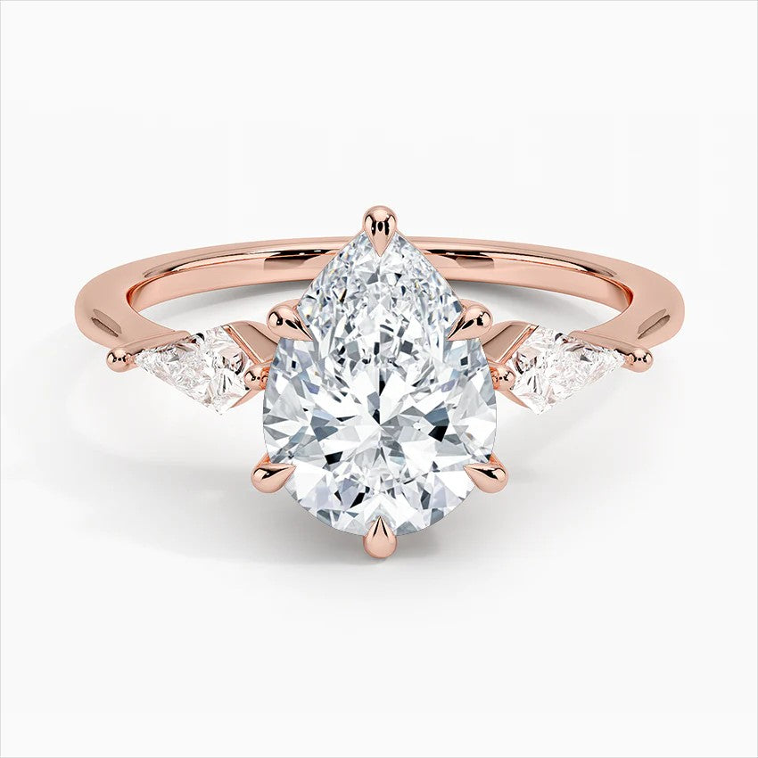 Pear Cut Three-Stone Engagement Ring with Pear Side Accent Diamonds in Solid Gold⁠