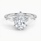 Pear Cut Three-Stone Engagement Ring with Pear Side Accent Diamonds in Solid Gold⁠