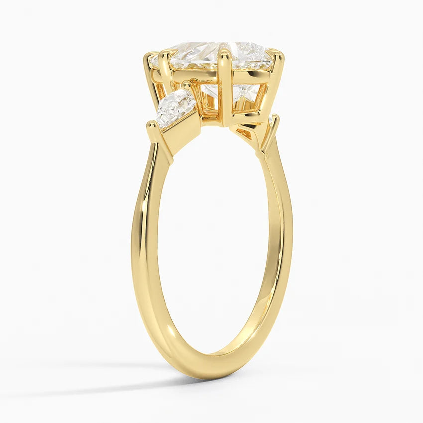 Pear Cut Three-Stone Engagement Ring with Pear Side Accent Diamonds in Solid Gold⁠
