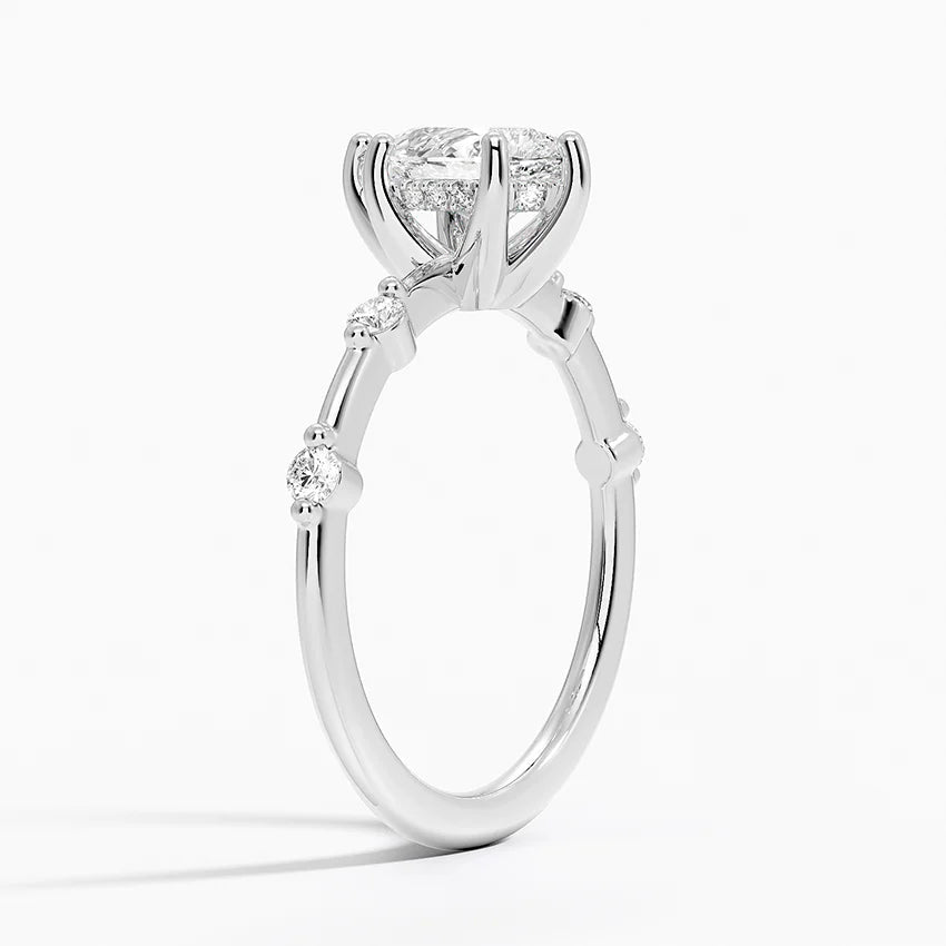 Pear Cut Accent Station Engagement Ring in Solid Gold