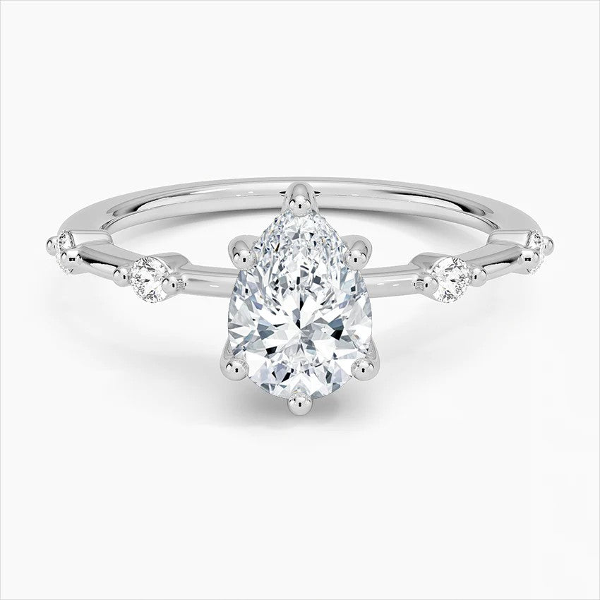 Pear Cut Accent Station Engagement Ring in Solid Gold