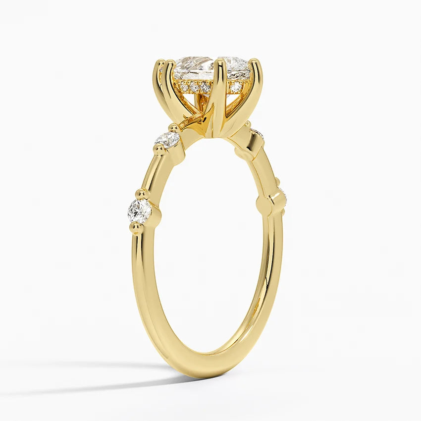 Pear Cut Accent Station Engagement Ring in Solid Gold