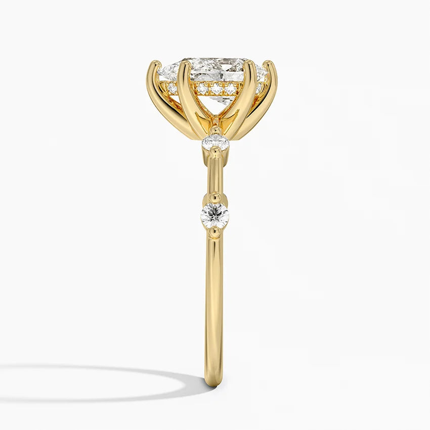 Pear Cut Accent Station Engagement Ring in Solid Gold