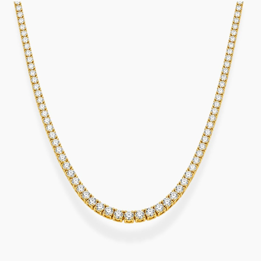 Gold necklace with clear stones on a white background, ecomposer-metal type-yellow-gold-18k
