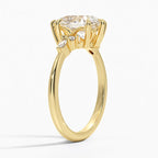 Pear Cut Cluster Side Stone Engagement Ring in Solid Gold⁠
