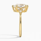 Pear Cut Cluster Side Stone Engagement Ring in Solid Gold⁠