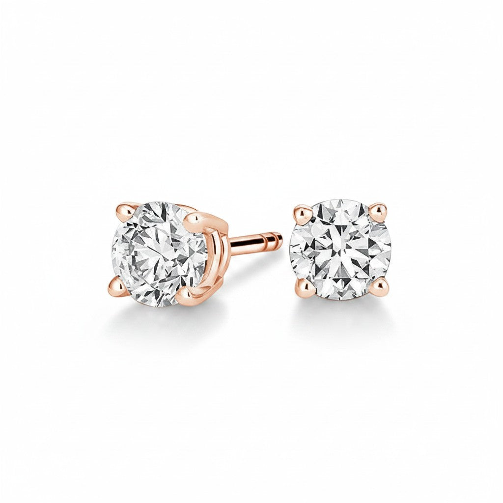 My Store 4 18K solid gold stud earrings featuring 1.5 carat round lab-grown diamonds in a classic four-prong setting.