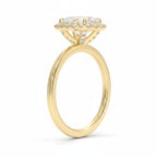 My Store 4 18K solid gold halo engagement ring featuring a central lab-grown diamond with side diamond accents.