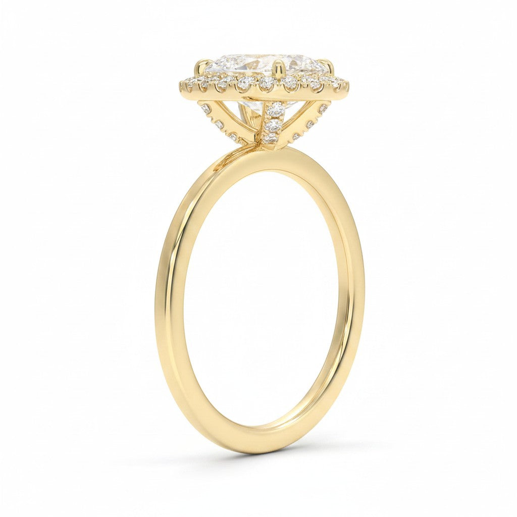 My Store 4 18K solid gold halo engagement ring featuring a central lab-grown diamond with side diamond accents.