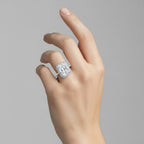My Store 4 18K solid gold halo pavé lab diamond ring worn on a finger, featuring a radiant cut center stone.