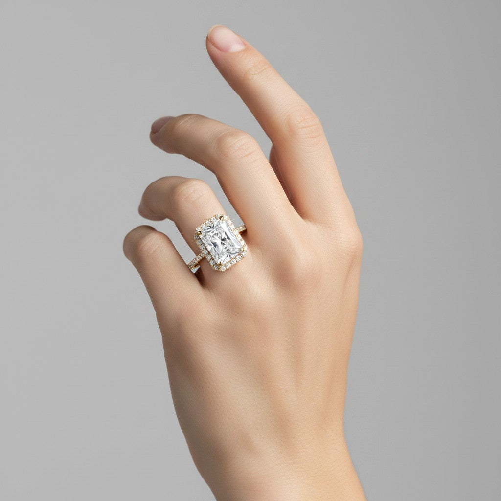 My Store 4 18K solid gold radiant cut lab diamond ring with a halo pavé setting worn on a woman's finger