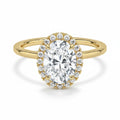 My Store 4 18K solid gold halo ring featuring an oval lab-grown diamond surrounded by sparkling accent stones.