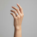My Store 4 18K solid gold pavé lab-grown diamond ring worn on a woman's finger, showcasing a brilliant round stone.