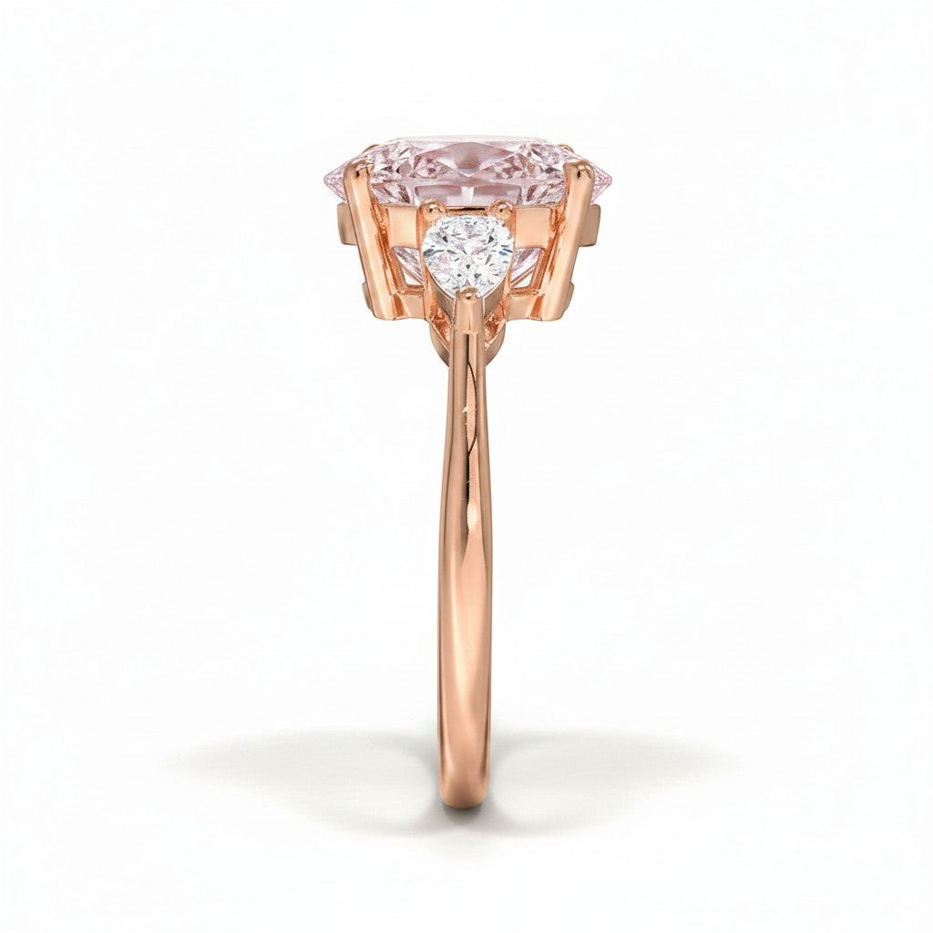 My Store 4 18K solid gold trilogy engagement ring with a pear-cut lab-grown diamond and pear side stones, side view.
