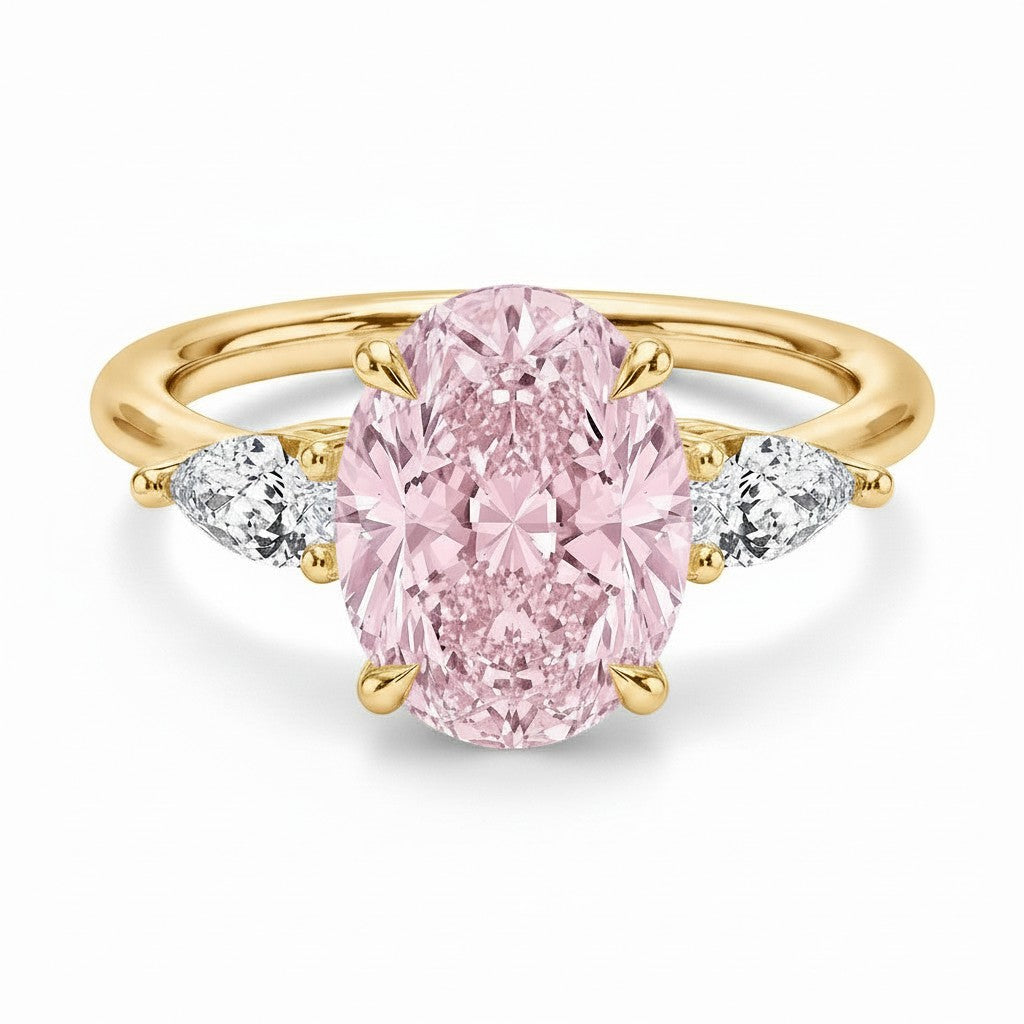 My Store 4 18K solid gold trilogy ring with a pink oval lab diamond centerpiece and pear-cut side diamonds.