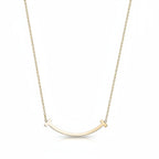 My Store 4 18K solid gold medium smile necklace with a curved minimalist design on a delicate chain