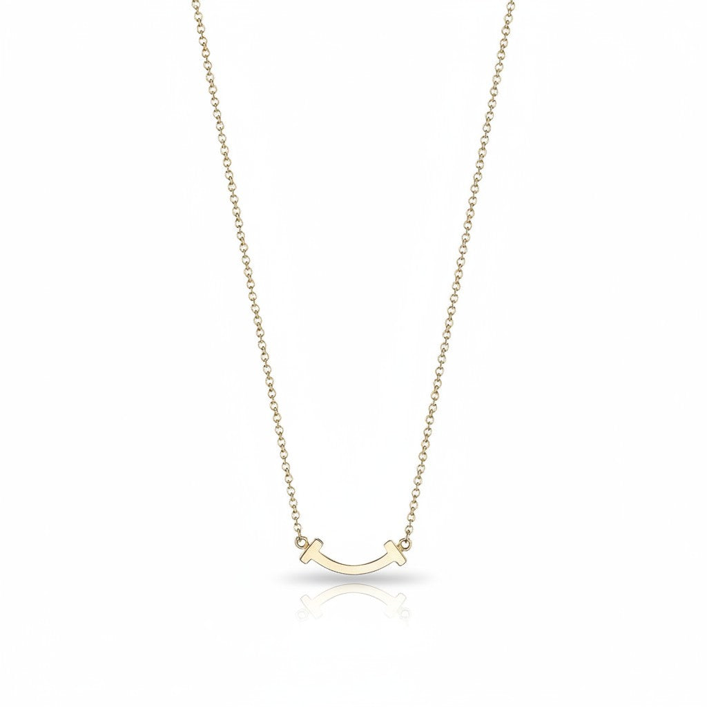 My Store 4 18K solid gold smile necklace featuring a delicate curved pendant on a fine chain