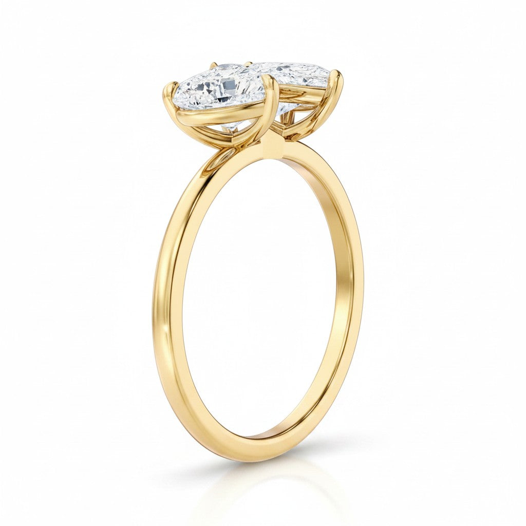 My Store 4 18K solid gold Toi et Moi ring featuring a pear and heart-cut lab-grown diamond set on a polished band.