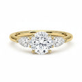 My Store 4 18K solid gold trilogy ring featuring a central round and two pear-cut lab-grown diamonds.