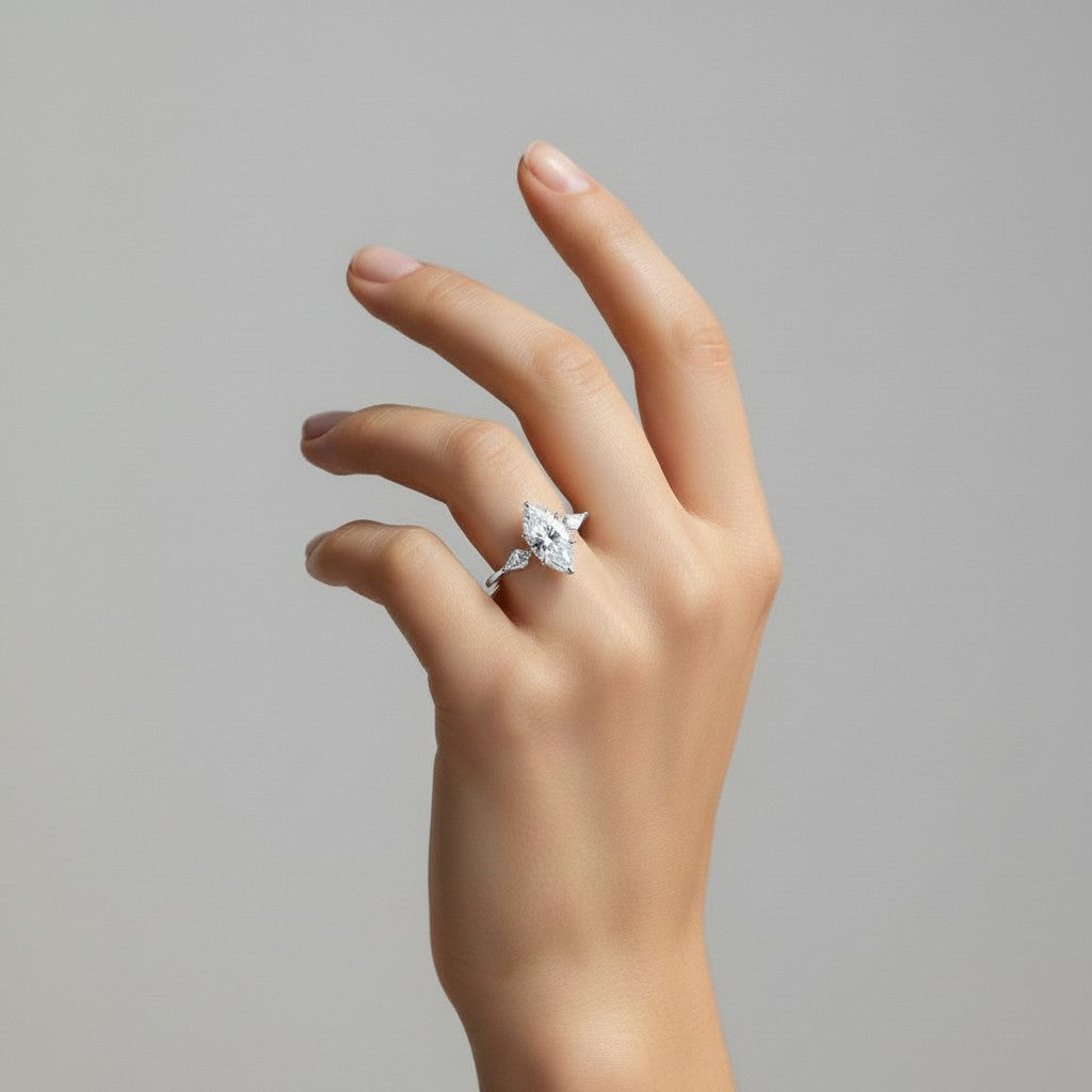 My Store 4 18K solid gold trilogy ring featuring a marquise lab-grown diamond on a hand, elegant and modern style.