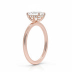 My Store 4 18K rose gold halo engagement ring featuring a central lab-grown diamond in a side profile view