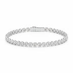My Store 4 modern bezel diamond line bracelet in white gold with round cut stones and a secure box clasp.