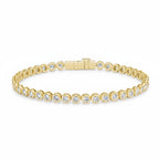 My Store 4 modern bezel round diamond tennis bracelet in 14K yellow gold with a secure box clasp.