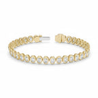 My Store 4 bezel set oval diamond tennis bracelet in 14K yellow gold with a secure box clasp
