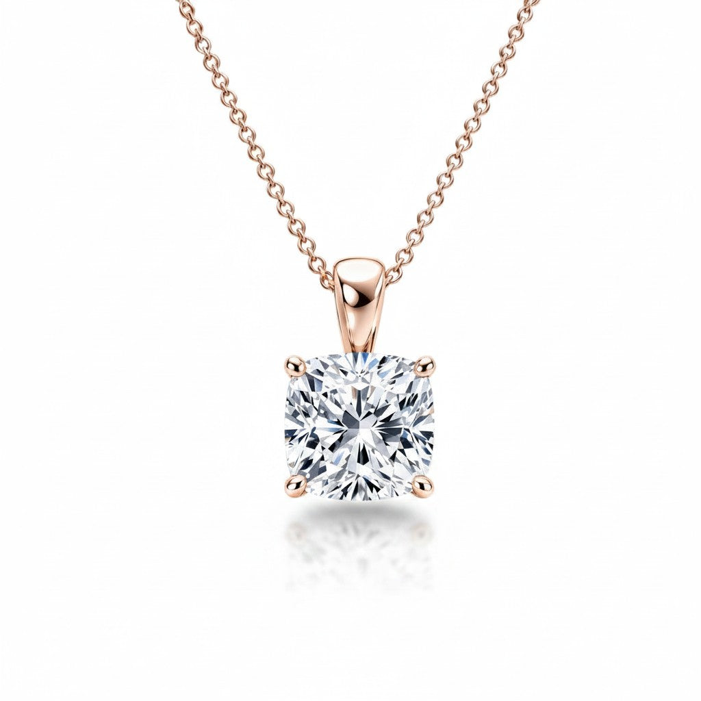 My Store 4 cushion-cut diamond solitaire pendant in rose gold with a tapered bail on a delicate matching chain.