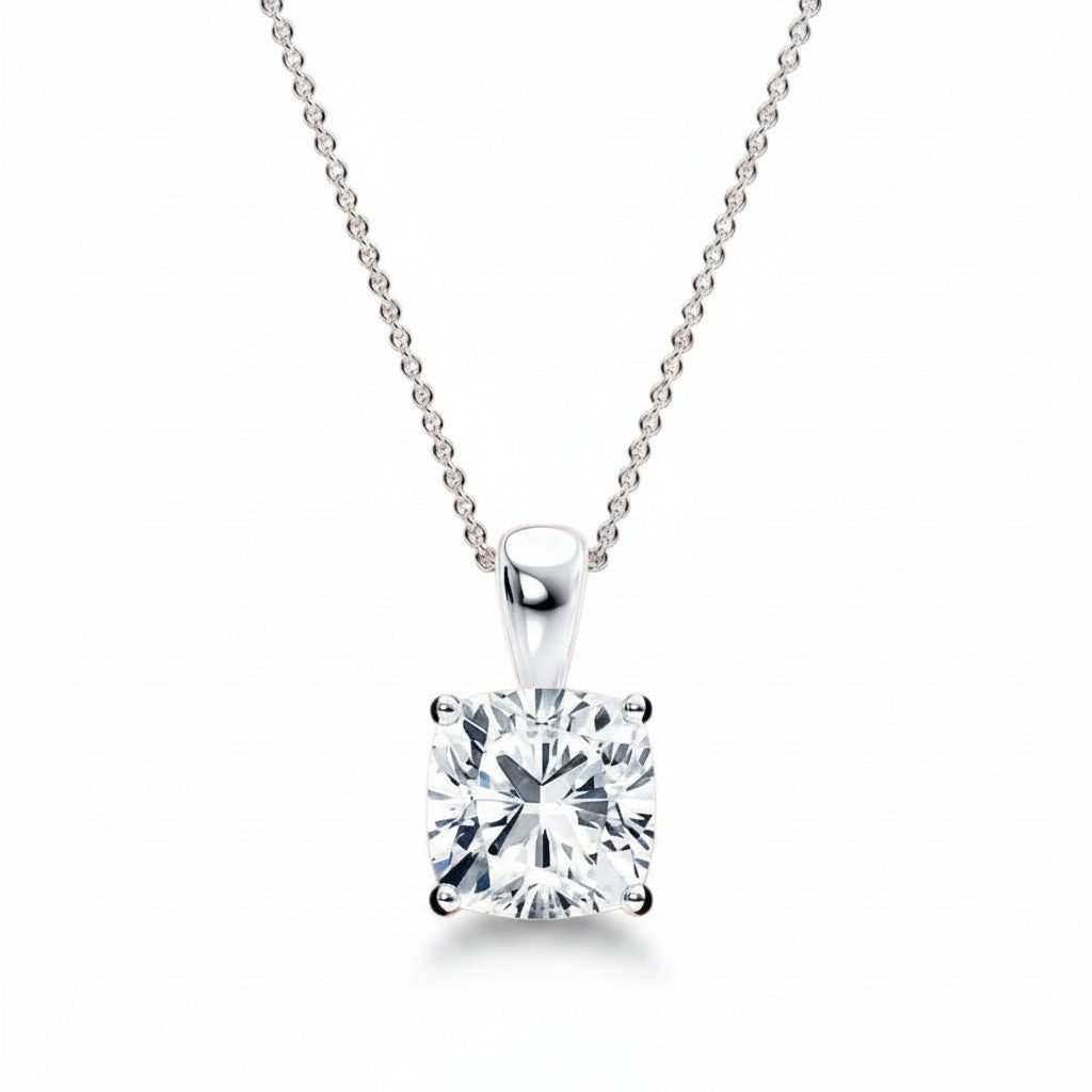 My Store 4 cushion-cut diamond solitaire pendant in white gold with a four-prong setting on a delicate chain.