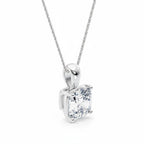 My Store 4 cushion-cut diamond solitaire pendant in white gold with a tapered bail on a delicate chain.