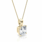 My Store 4 cushion-cut diamond solitaire pendant in 18K yellow gold with a tapered bail on a delicate gold chain.