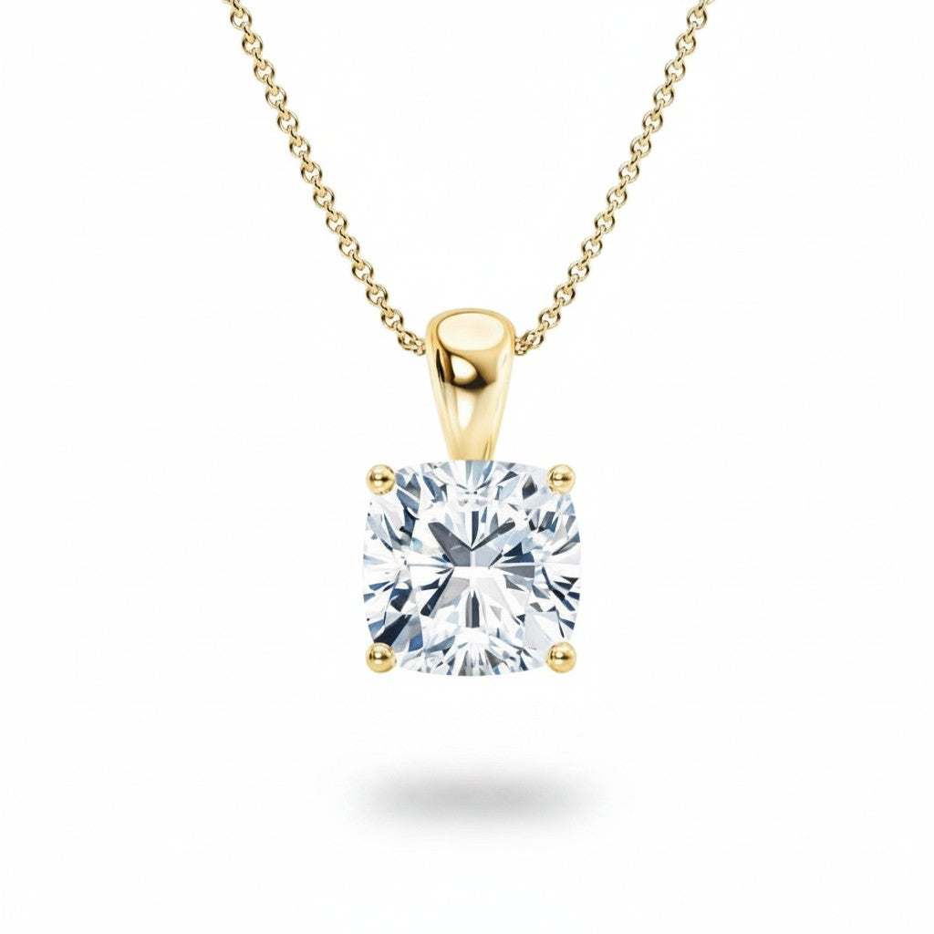 My Store 4 cushion-cut diamond solitaire pendant in 18K yellow gold with a four-prong setting and tapered bail.