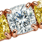 My Store 4 tennis bracelet featuring alternating cushion-cut fancy yellow and white diamonds in gold box settings.