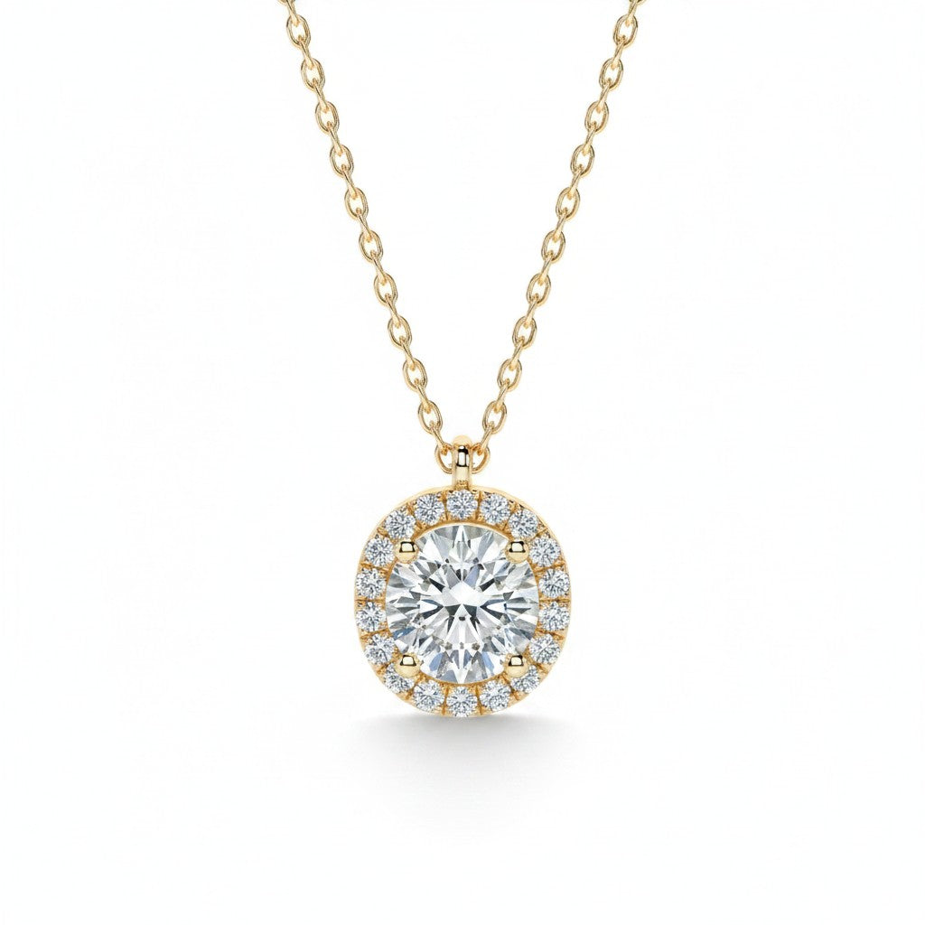 My Store 4 round brilliant diamond pendant in a micro-pave cushion halo setting on a delicate 18K yellow gold chain.