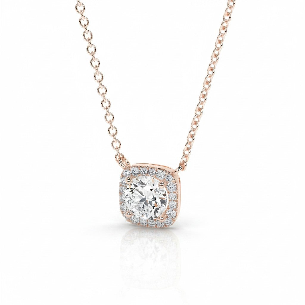 My Store 4 round brilliant diamond pendant in a micro-pave cushion halo setting on a delicate rose gold cable chain.