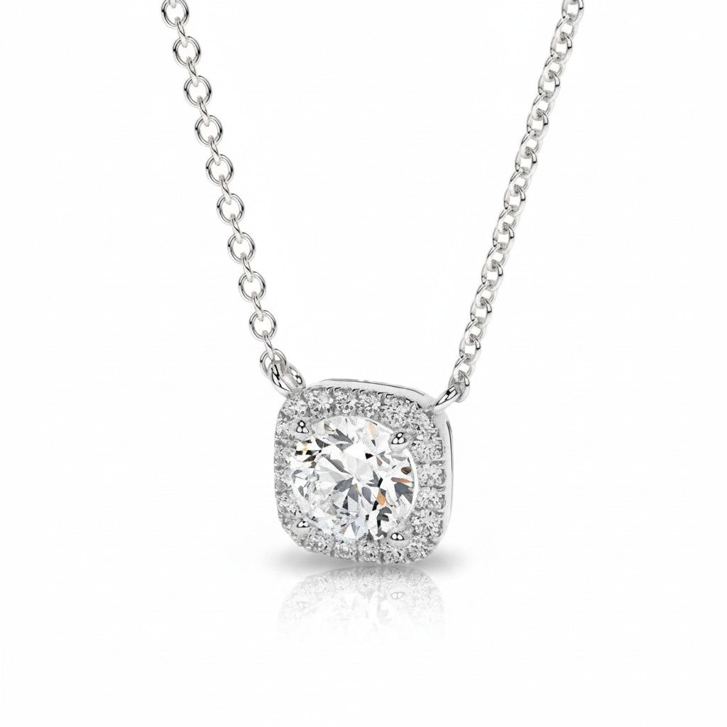 My Store 4 round brilliant diamond pendant with a micro-pave cushion halo in white gold on a delicate cable chain.