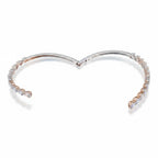 My Store 4 open bypass bangle bracelet featuring alternating pear and heart cut diamonds set in polished gold.