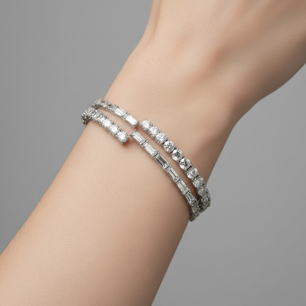 My Store 4 bypass open bangle bracelet featuring alternating baguette and round diamonds in a white gold setting.