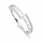 My Store 4 open bypass bangle bracelet in white gold featuring alternating rows of baguette and round cut diamonds.