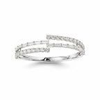 My Store 4 bypass open bangle bracelet featuring alternating baguette and round brilliant diamonds in white gold.