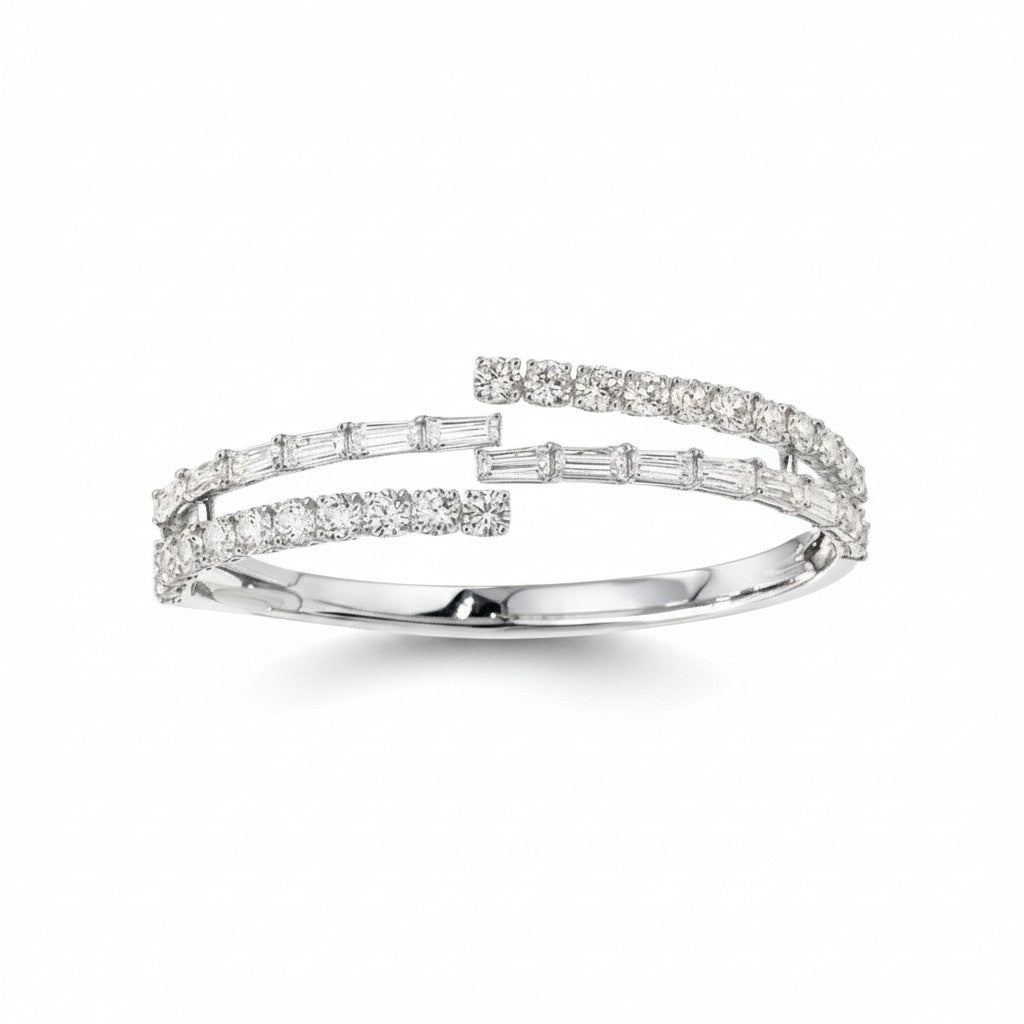 My Store 4 bypass open bangle bracelet featuring alternating baguette and round brilliant diamonds in white gold.